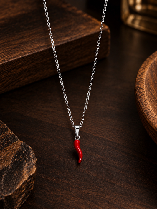Collana oro/argento con corno rosso