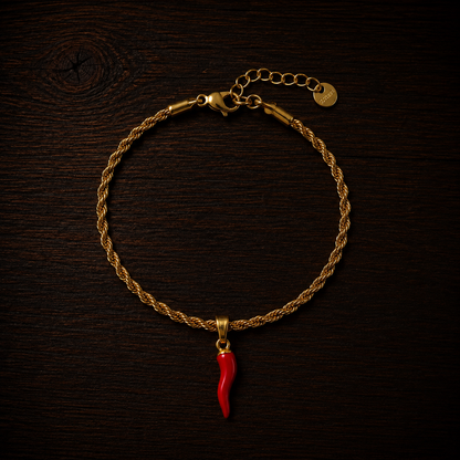 Bracciale intrecciato con corno rosso
