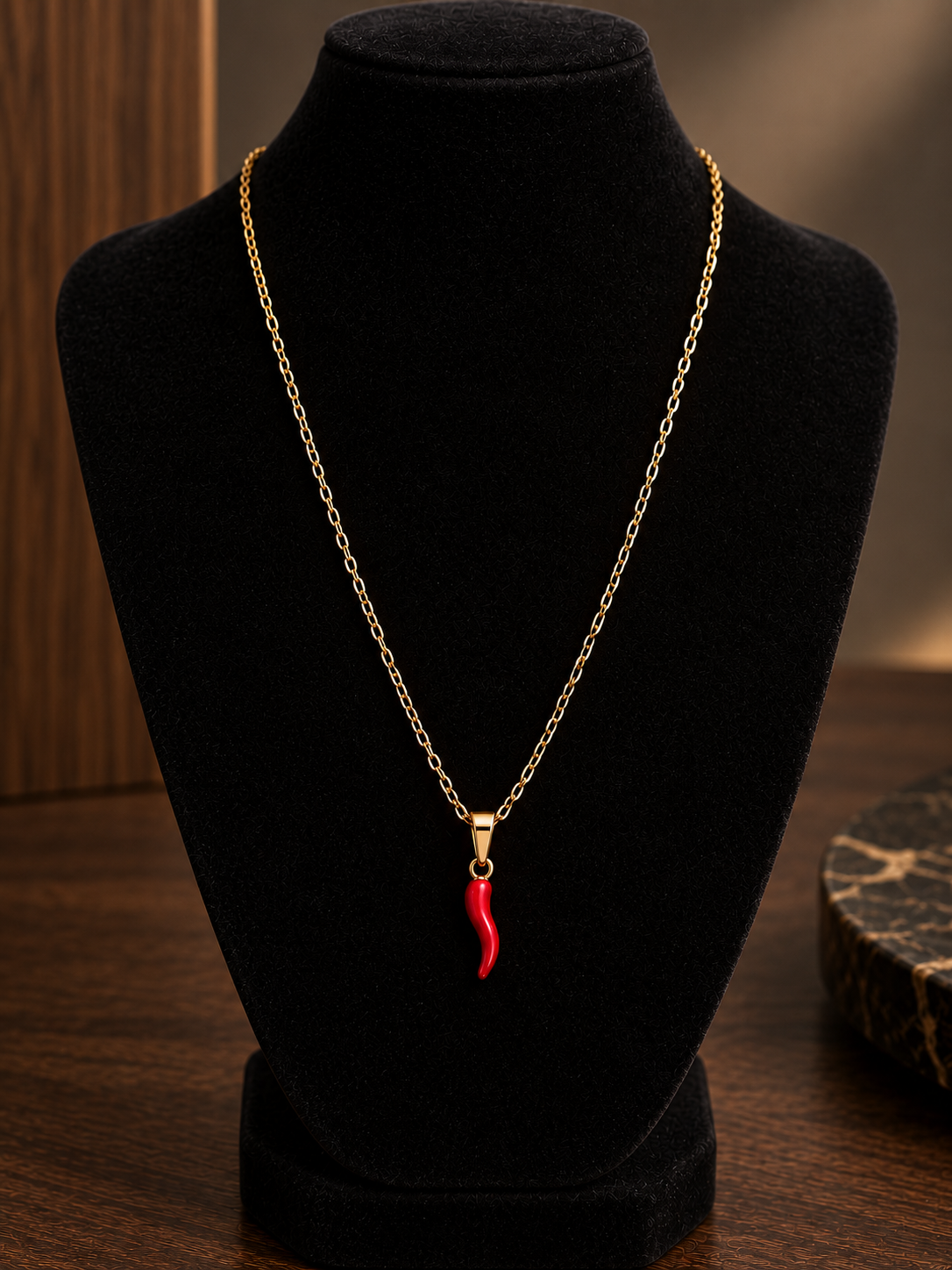Collana oro/argento con corno rosso