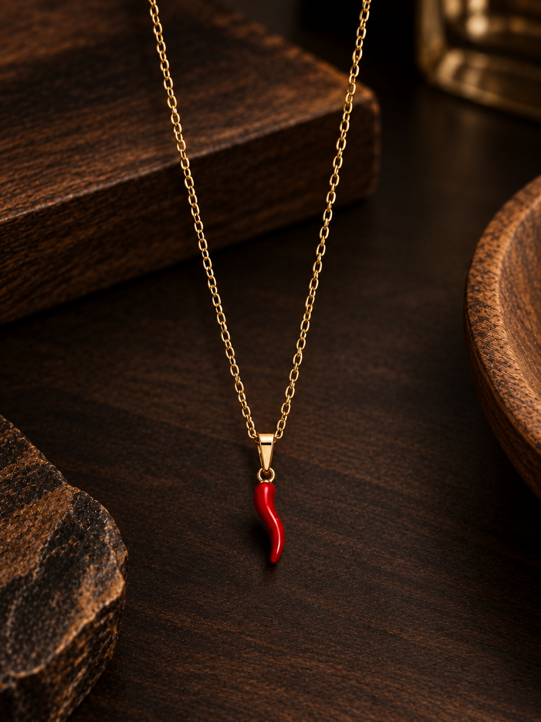 Collana oro/argento con corno rosso