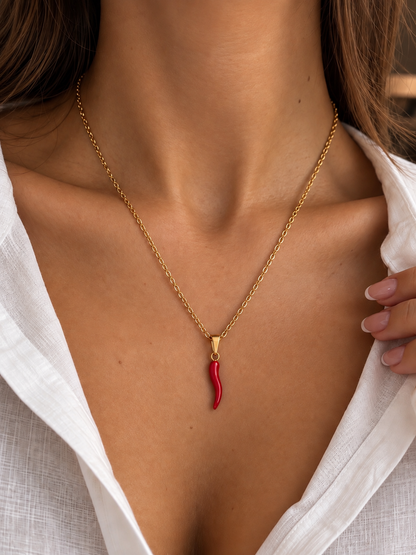 Collana oro/argento con corno rosso