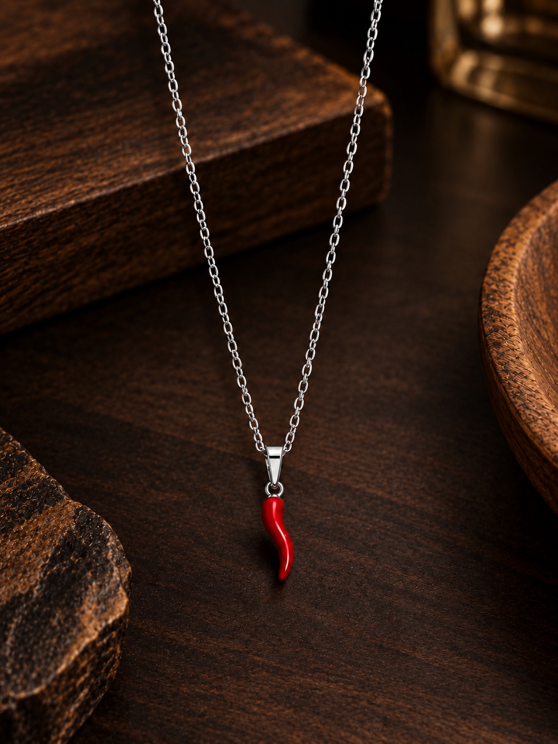 Collana oro/argento con corno rosso