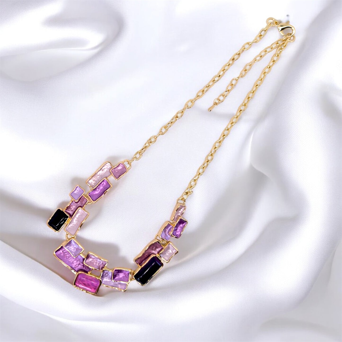 Completo collana e orecchini viola