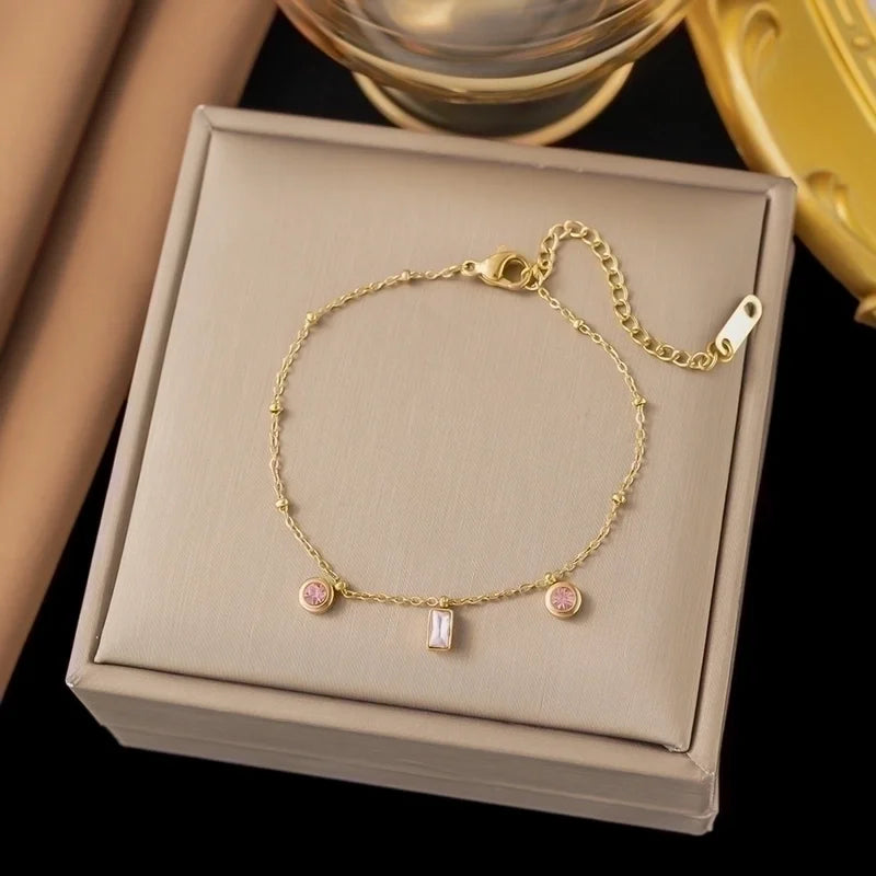 Bracciale sottile oro con pendenti