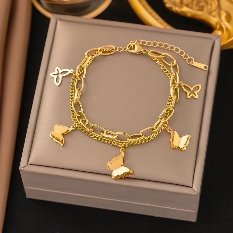 Bracciale oro con farfalle